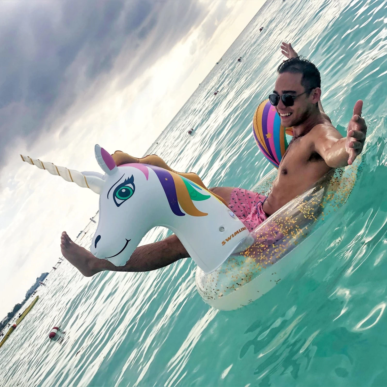 Swimline LED Light Up Inflatable Glitter Unicorn Ring 6 Swimline LED Light Up Inflatable Glitter Unicorn Ring - Image 4