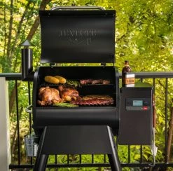 Traeger Pro 575 Black WiFi-Enabled Pellet Grill 28 Traeger Pro 575 Black WiFi-Enabled Pellet Grill -Outdoor Garden Living Pro 575 People at grill 016